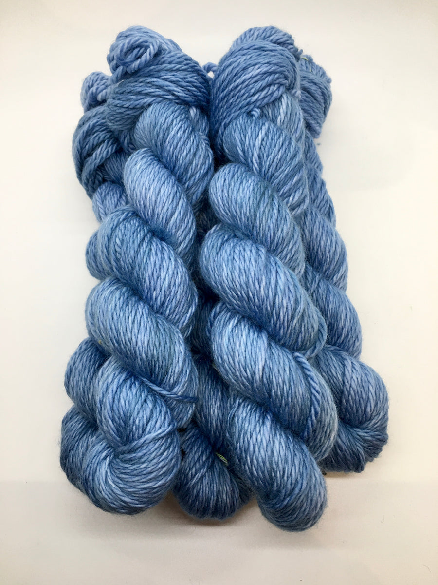Leaden Flycatcher Feather – Robin's Promise Yarn Co.