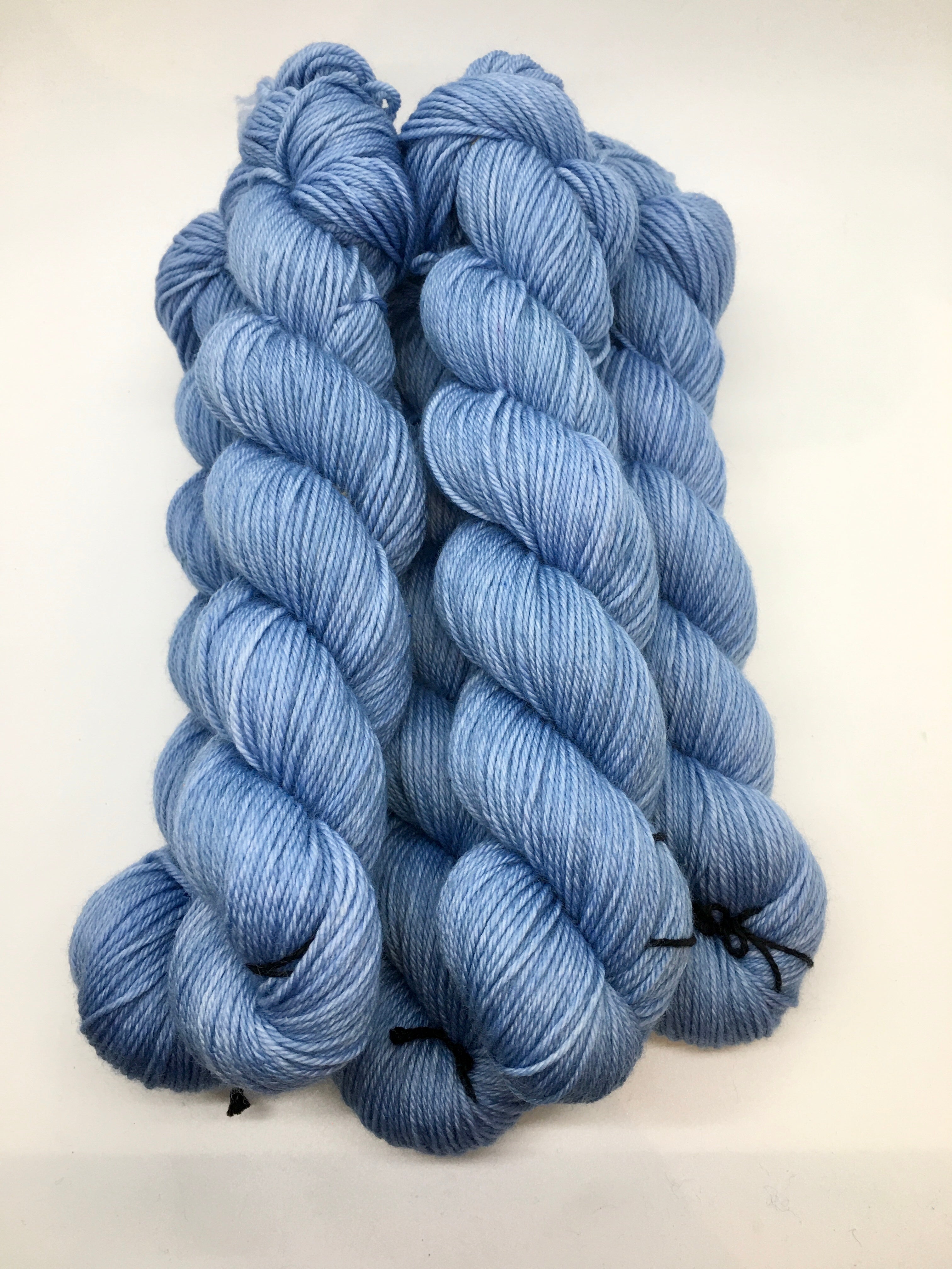 Leaden Flycatcher Feather – Robin's Promise Yarn Co.